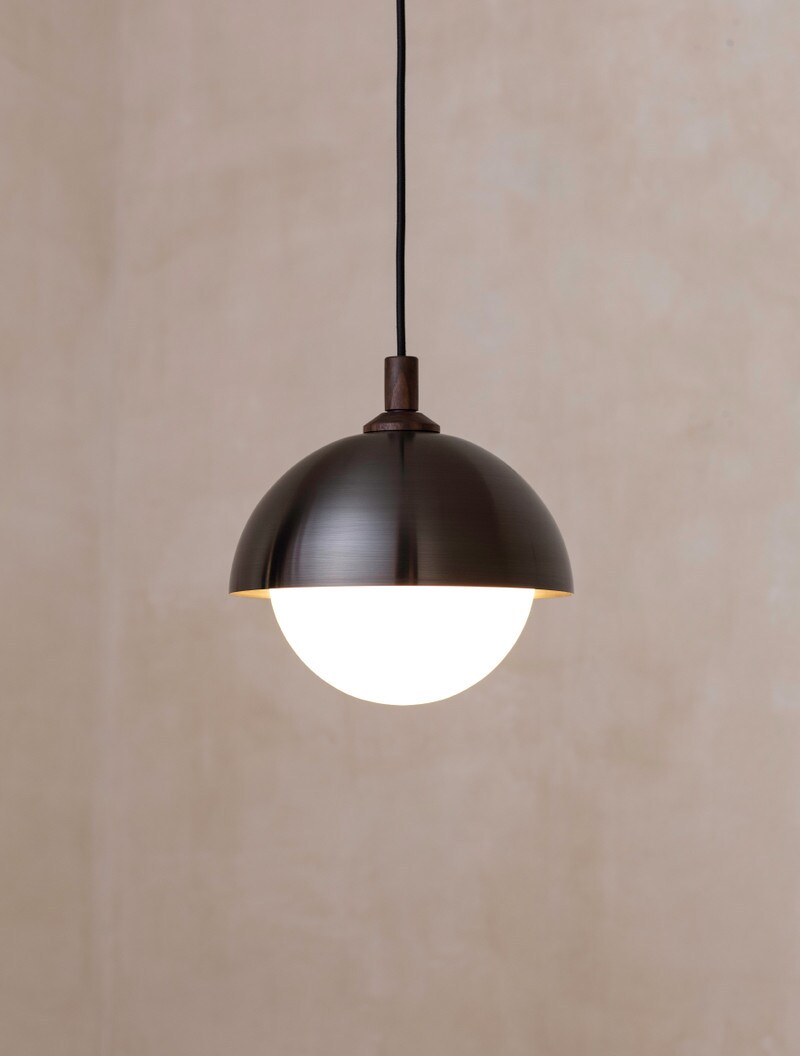 Dome Pendant 10" shown in Blackened Brass, Black Walnut, Matte White Globe